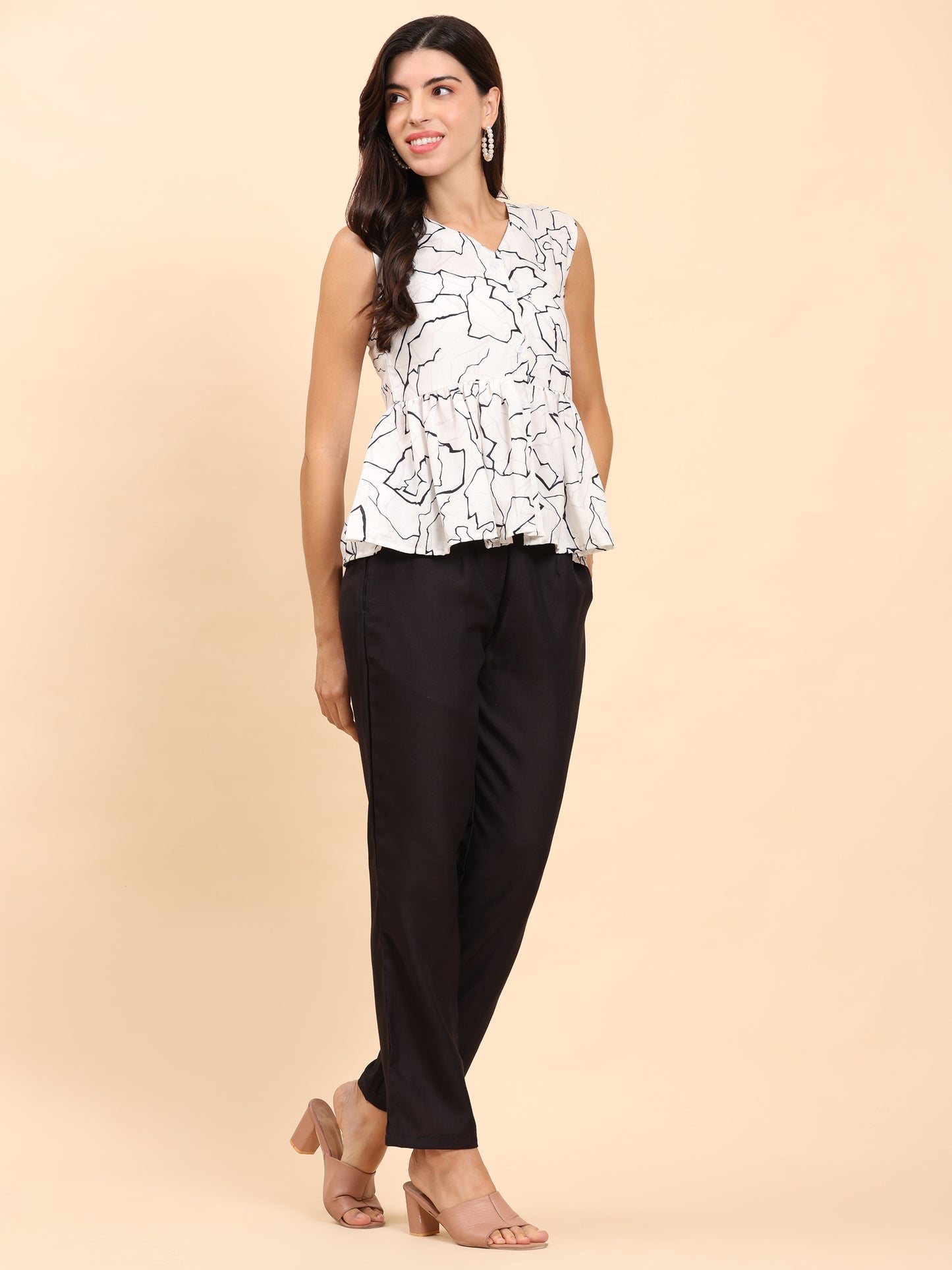 Noia White & Black Abstract Sleeveless Peplum Top with Trousers