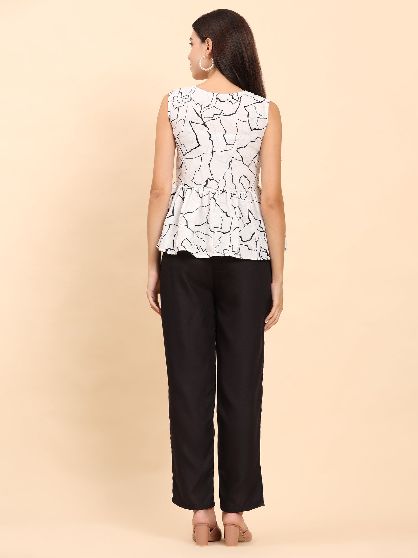 Noia White & Black Abstract Sleeveless Peplum Top with Trousers